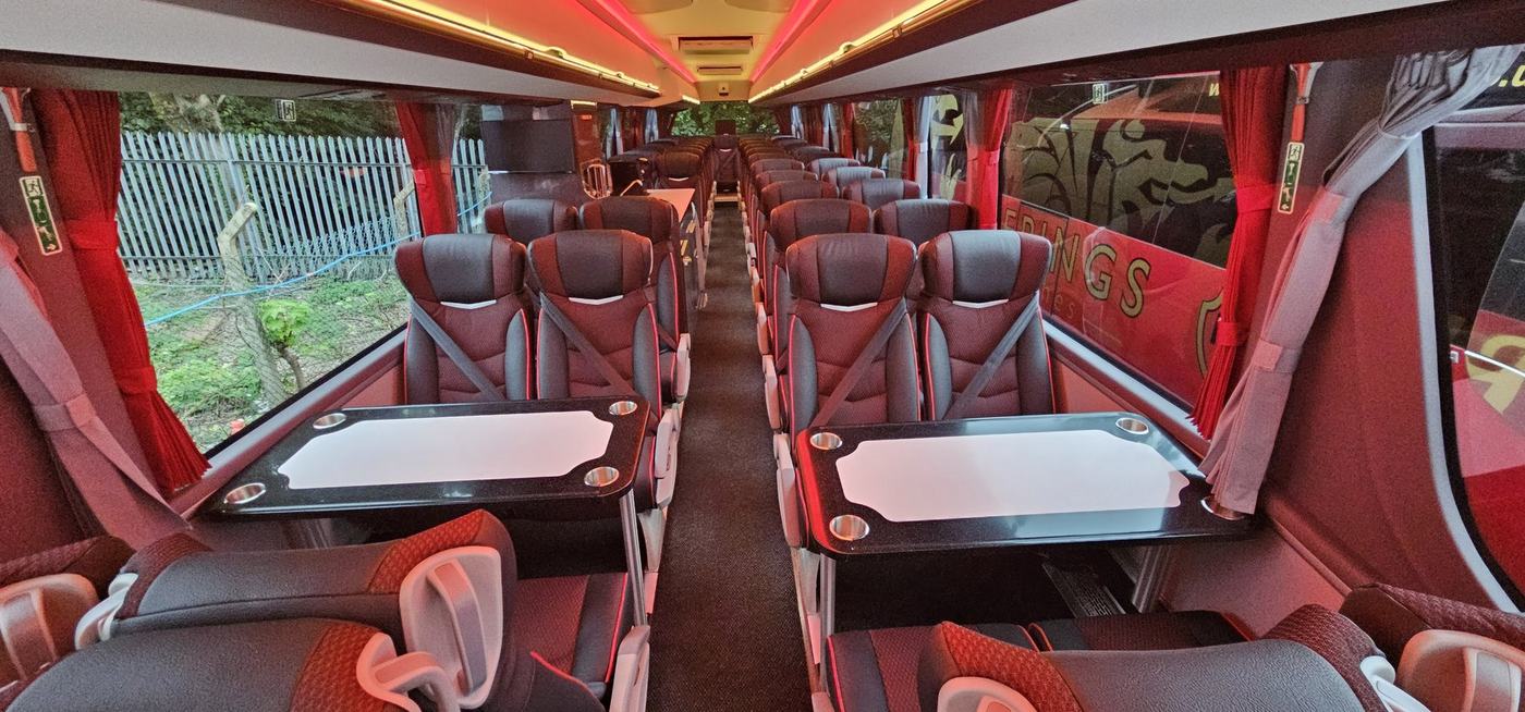 Interior of the Keepings Coaches 53-seat table coach with tables