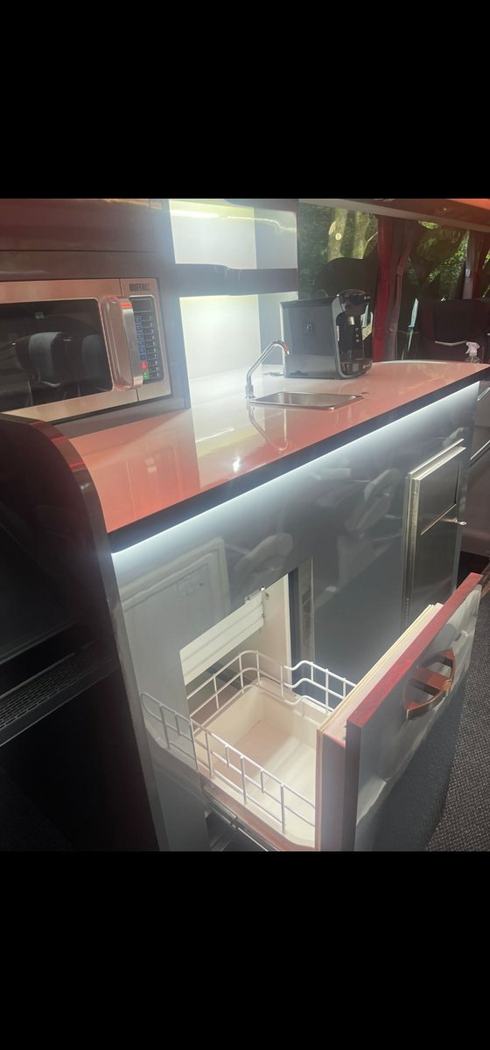 Microwave & coffee on the 42-seat team coach