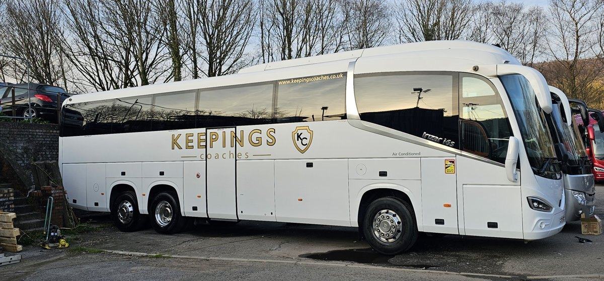 Keepings Coaches white executive coach